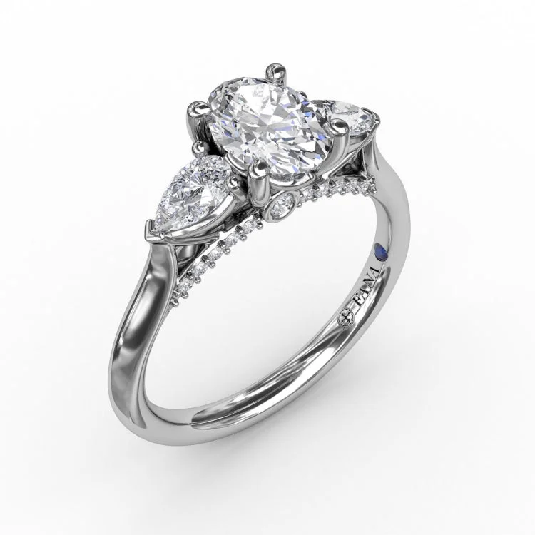 Classic Oval Three-Stone Diamond Engagement Ring With Pear-Shape Side Diamonds