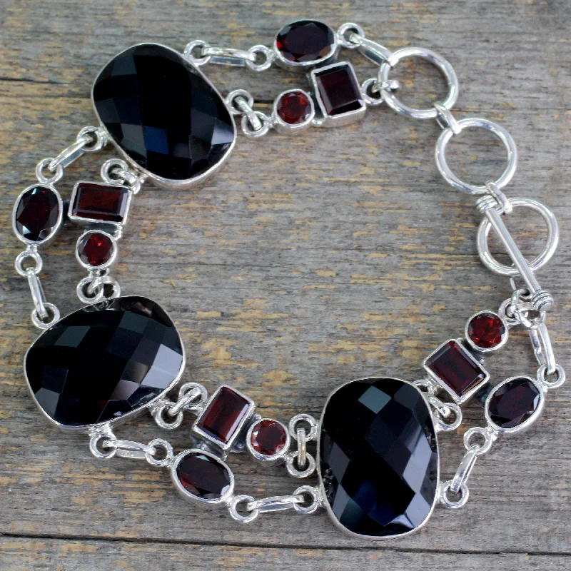 Exotic Drama Onyx Link Bracelet with Garnet and Sterling Silver